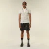 Camiseta polo de punto de malla abierta