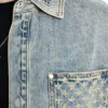 Chaqueta vaquera desgastada con láser
