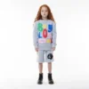 Pantalones cortos con insignia para BOY