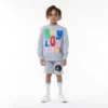Pantalones cortos con insignia para BOY