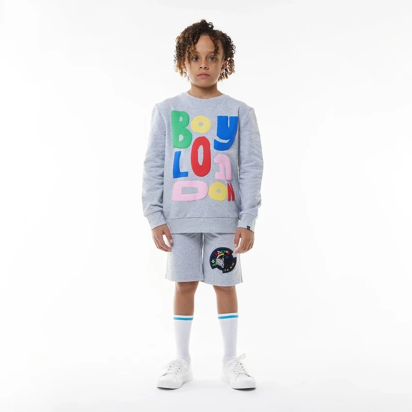 Pantalones cortos con insignia para BOY