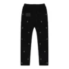 Pantalones de chándal con múltiples ojales