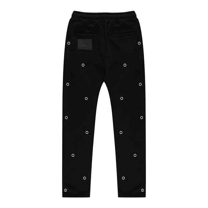 Pantalones de chándal con múltiples ojales