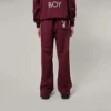 Pantalones de chándal de nailon de pierna ancha Playboy x BOY