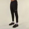 Pantalones entallados de jersey con cremallera