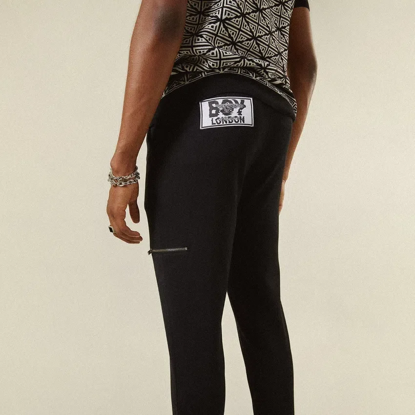 Pantalones entallados de jersey con cremallera