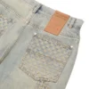 Pantalones vaqueros desgastados con láser